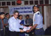 Manjunath Receiving the Award from the National Commissioner of India